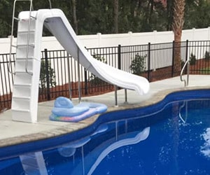 fiberglass swimming pool with a slide
