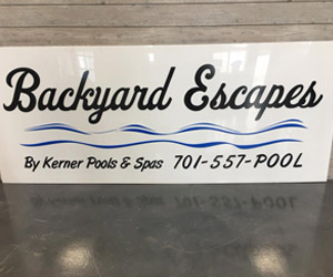 backyard escapes by kerner pool & spas sign